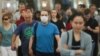 Russian officials have recommended residents wear masks and get another vaccine shot.