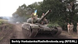 Украински военни в района на източните градове Балаклия и Изюм в Харковска област.
