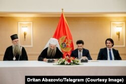 Foto nga nënshkrimi i Marrëveshjes Themelore mes Qeverisë së Malit të Zi dhe Kishës Ortodokse Serbe në Podgoricë, më 3 gusht 2022.
