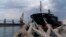 A ship full of grain sits anchored in the Ukrainian port of Odesa on July 29. 
