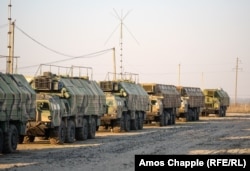 Military vehicles inside the missile base.