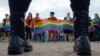 People wave rainbow flags during a gay-pride rally in St. Petersburg in 2017.