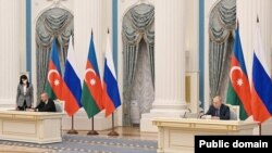 Ռուսաստանի նախագահ Վլադիմիր Պուտինը և Ադրբեջանի նախագահ Իլհամ Ալիևը ստորագրում են երկու երկրների միջև դաշնակցային փոխգործակցության մասին հռչակագիրը, Մոսկվա, 22-ը փետրվարի, 2022թ․