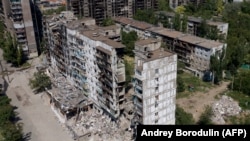Розбиті авіаударами будинки Маріуполя, липень 2022 року
