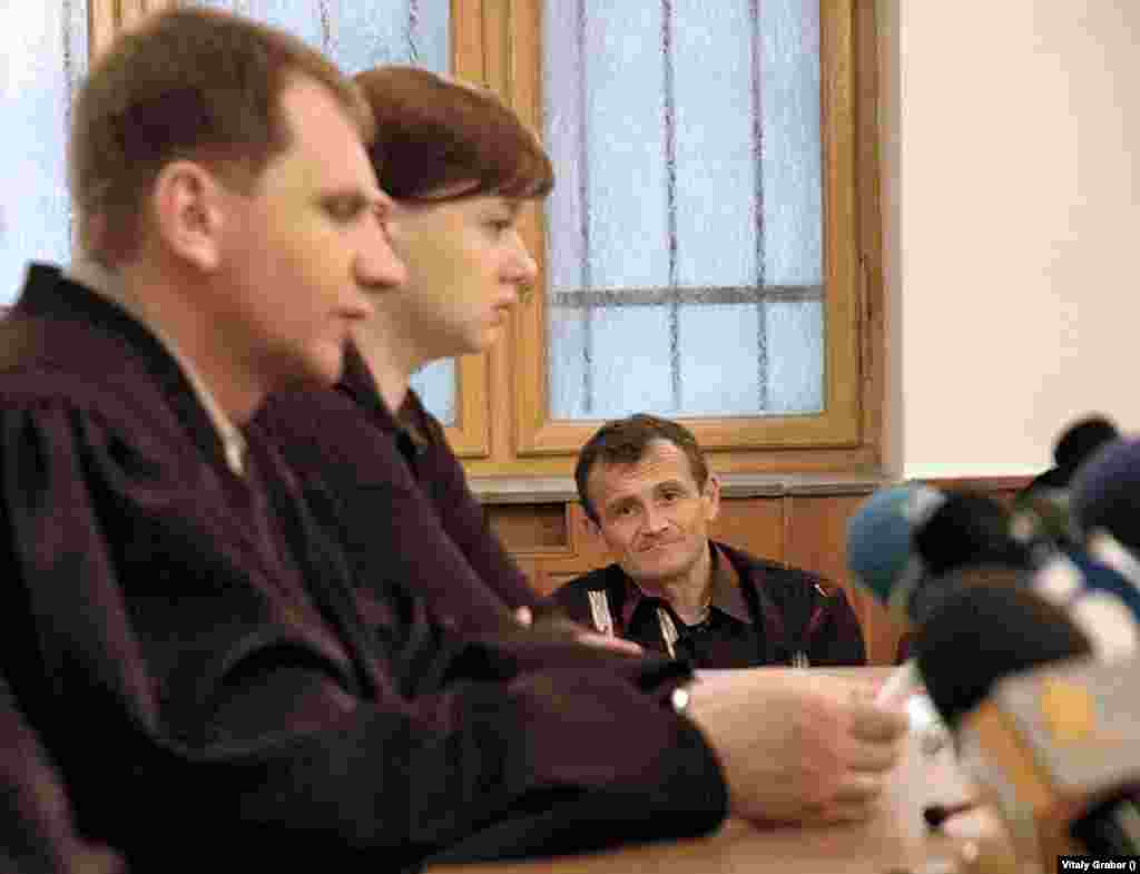 On June 24, 2005, a military court sentenced pilot Volodymyr Toponar (seen in background) and co-pilot Yuriy Yegorov to 14 and five years in prison, respectively.&nbsp; &quot;The main cause of the plane crash was a failure to respect the flight plan and aerial maneuvers that were not on the program,&quot; inquiry chief Yevhen Marchuk said at the time.