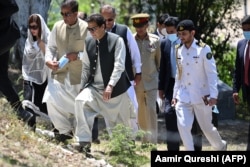 Then-Prime Minister Imran Khan visits a tree-planting site in Khyber Pakhtunkhwa Province in May 2021.