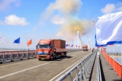 Открытие первого пограничного моста через реку Амур между Россией и Китаем. Июнь 2022 года