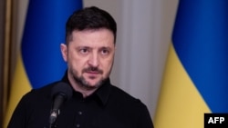 Ukrainian President Volodymyr Zelenskyy speaks during a meeting of national security advisers in Kyiv on January 3.