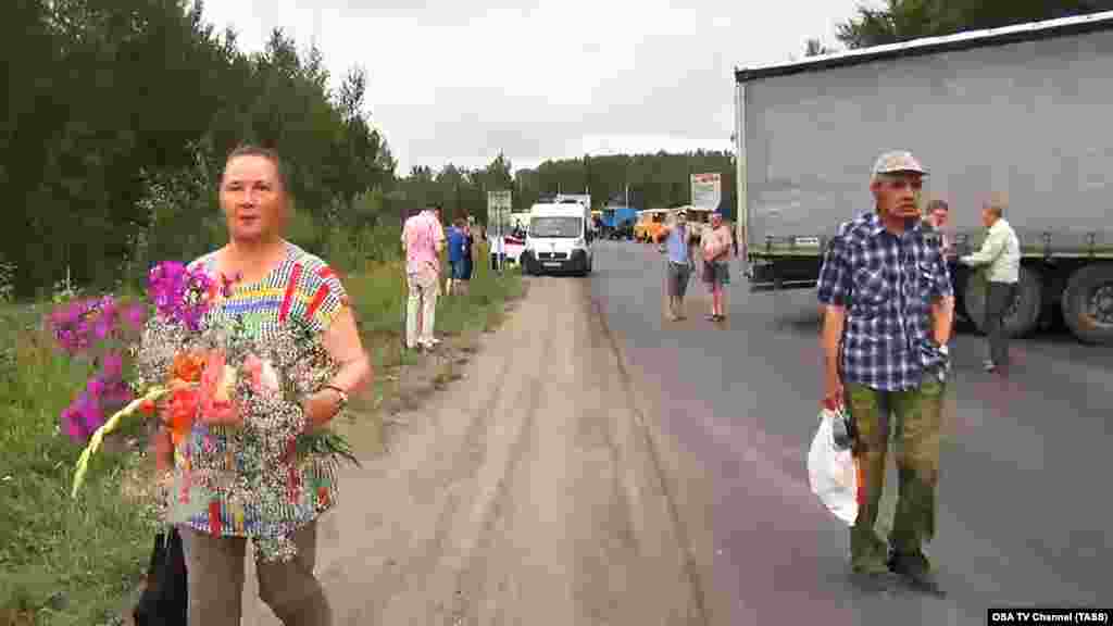 RUSSIA -- Residents of the settlements located within the radius of 20 km from the village of Kamenka, Achinsk District are being evacuated due to a fire after explosions at a military ammunition depot; August 5, 2019
