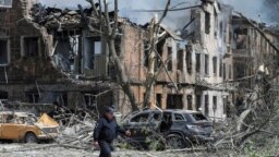 Rescuers work at the site of a Russian strike in Dnipro on May 26.