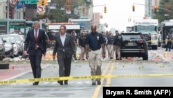 Guverner i gradonačelnik Njujorka Andrew Cuomo i Bill de Blasio dolaze na mesto gde se dogodila eksplozija, 18. septembar