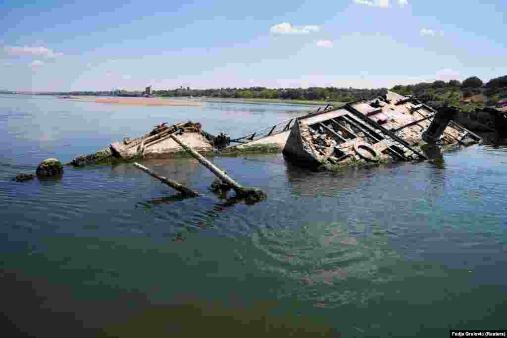 The Danube has dropped to one of its lowest levels in almost a century as a result of Europe&#39;s worst drought in recent memory, exposing the wrecks of German ships that were scuttled during World War II.