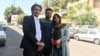 Sepideh Rashno, pictured with her lawyer and brother following her release on August 30, arrested on June 15 after a video of her arguing with another woman who was enforcing rules on wearing a head scarf on a bus in Tehran went viral.