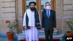 Taliban Foreign Minister Amir Khan Muttaqi meets with Chinese Foreign Minister Wang Yi in Kabul in March.