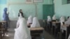 A teacher and students at a class in Farah Province (file photo)