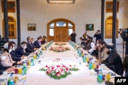 Officials from the Taliban's Foreign Ministry host a visiting delegation of Chinese diplomats in Kabul in March.