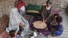 This family in Kandahar eats bread with tea for breakfast.<br />
<br />
Women and children are the most vulnerable to hunger. Earlier this year, the United Nations Children&#39;s Fund (UNICEF) warned that some 1.1 million Afghan children under the age of 5 risked dying of severe acute malnutrition, while more than 3.2 million children faced malnutrition.