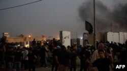  На тази фотография се виждат поддръжници на Муктада ас-Садр в Багдад на 29 август. 