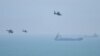 Helikopterët ushtarakë kinezë duke fluturuar pranë ishullit Pingtan, që është pika më e afërt e territorit kinez me atë të Tajvanit. 4 gusht 2022.