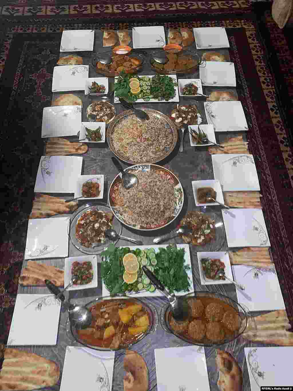 Before the Taliban seized power, Hasibullah says his family would regularly buy meat, fresh vegetables, and fruit. Here, Hasibullah provides a photo of what his dining rug looked like a year ago.