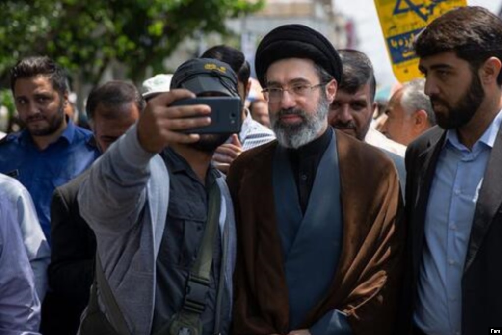 Mojtaba Khamenei (center) lacks administrative experience and will likely face allegations of nepotism if he succeeds his father.