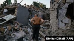 Oleksandr Sulga surveys his damaged home, which was destroyed by a missile strike in Mykolayiv on August 29. 