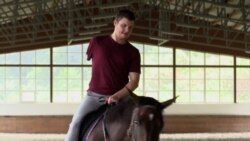 Horseback Therapy Aids Ukrainian War Amputees' Path To Recovery