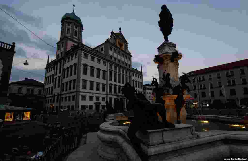 The town hall of Augsburg and the surrounding square are normally brightly lit in the evening.&nbsp; From September, Germany&#39;s rail network will prioritize trains carrying coal and oil, meaning passenger trains will need to wait as the fuel wagons move through.&nbsp;