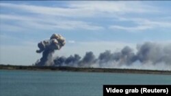 Exploziile de la o bază militară rusă din peninsula Crimeea, anexată abuziv de Rusia, 11 august 2022.