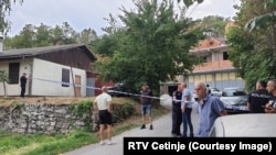 Police cordon off the crime scene after the August 12 shooting rampage in Cetinje, southwestern Montenegro. 