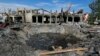 A crater from Russian shelling is seen in the settlement of Zatoka near the southern Ukrainian city of Odesa on August 18.
