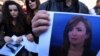 Students of Irbil's College of Journalism hold portraits of Shifa Gardi, a journalist for the network Rudaw who was killed while covering the Mosul offensive, during a memorial ceremony in Irbil on February 26.