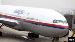 Малазийский самолет в аэропорту Пекина. Архивное фото.
