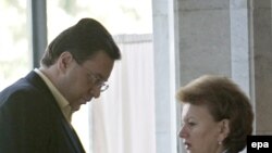 Marian Lupu (left) speaks with acting Prime Minister Zinaida Greceanii at the Republican Palace in Chisinau on May 28.