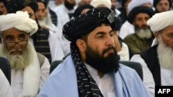 یوشمېر دیني عالمان په کندهار کې په یوه غونډه کې د ګډون پر مهال - انځور له ارشیفه.