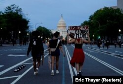 Protestatrii din Washington au demonstrat în fața Casei Albe și a Capitoliului.
