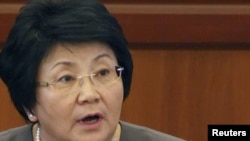 President Roza Otunbaeva is trying to put together a coalition government