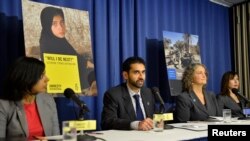 U.S. -- Amnesty International's (AI) Pakistan Researcher Mustafa Qadri (2nd L) makes remarks at a press briefing in Washington October 22, 2013