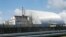 A shelter construction covers the exploded reactor at the Chernobyl nuclear plant.