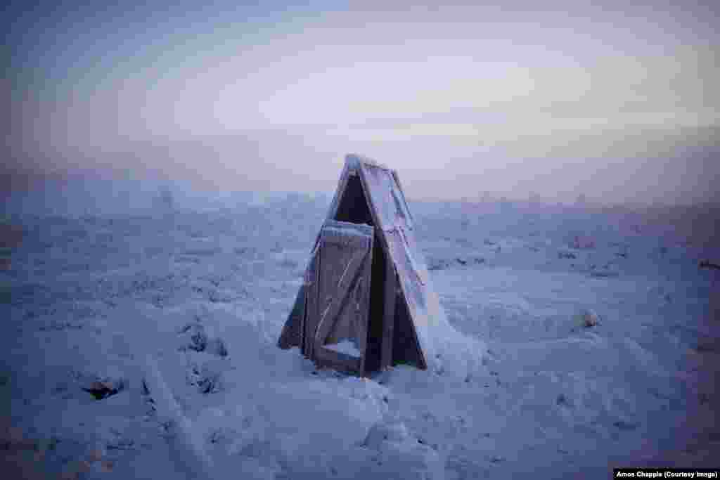 Toilets in the village are simple pits (covered by shacks like this) due to underground plumbing being impractical in the shifting, permanently frozen ground of Oymyakon.