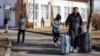 A man passes through a Romania-Ukraine border-crossing point in February 22, shortly after the start of Russia's full-scale invasion. 