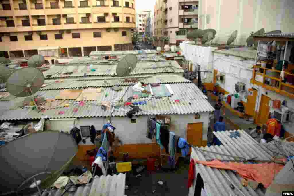 Other workers have been squeezed out of their rooms by overcrowding and sleep on the roofs of their buildings.