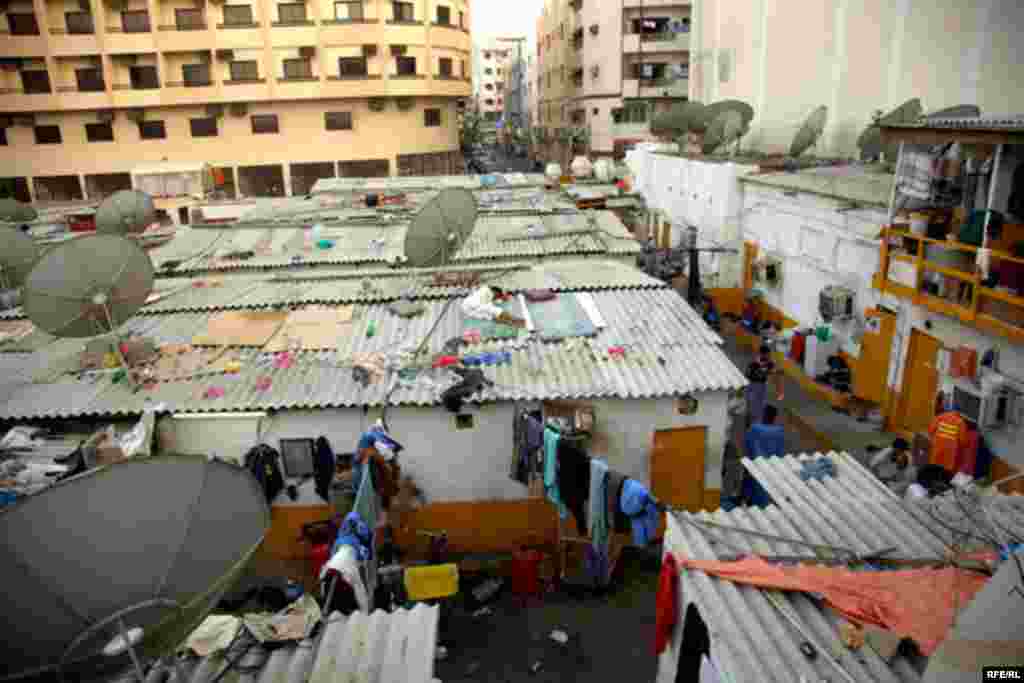 Other workers have been squeezed out of their rooms by overcrowding and sleep on the roofs of their buildings.