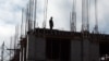 Skopje - Macedonia - Worker standing on top of a building in construction