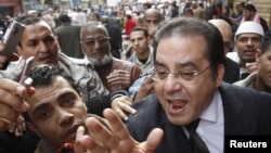 Opposition politician Ayman Nour speaks during a rally on Cairo's Tahrir Square on February 1. 