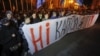 "No capitulation!": Far-right activists protest against Ukraine agreeing to the so-called Steinmeier Formula near of the president's office in Kyiv on October 1.