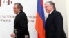 Armenia - Foreign Minister Edward Nalbandian (R) and Uruguay's Foreign Minister Luis Almagro arrive at a news conference in Yervan, 4May2012.