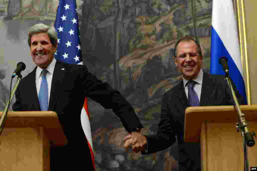 U.S. Secretary of State John Kerry (left) and his Russian counterpart, Sergei Lavrov, speak at a joint press conference in Moscow after announcing top-level talks to push the Syrian regime and rebels to find a political solution to their conflict and to hold an international peace conference. (AFP/Kirill Kudryavtsev)