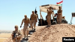 أفراد من البشمركة في دورية قرب الموصل - 22 حزيران 2014