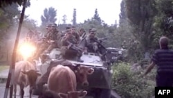 A Russian armored personnel carrier at an unnamed location in Georgia's breakaway Abkhazia region on August 11